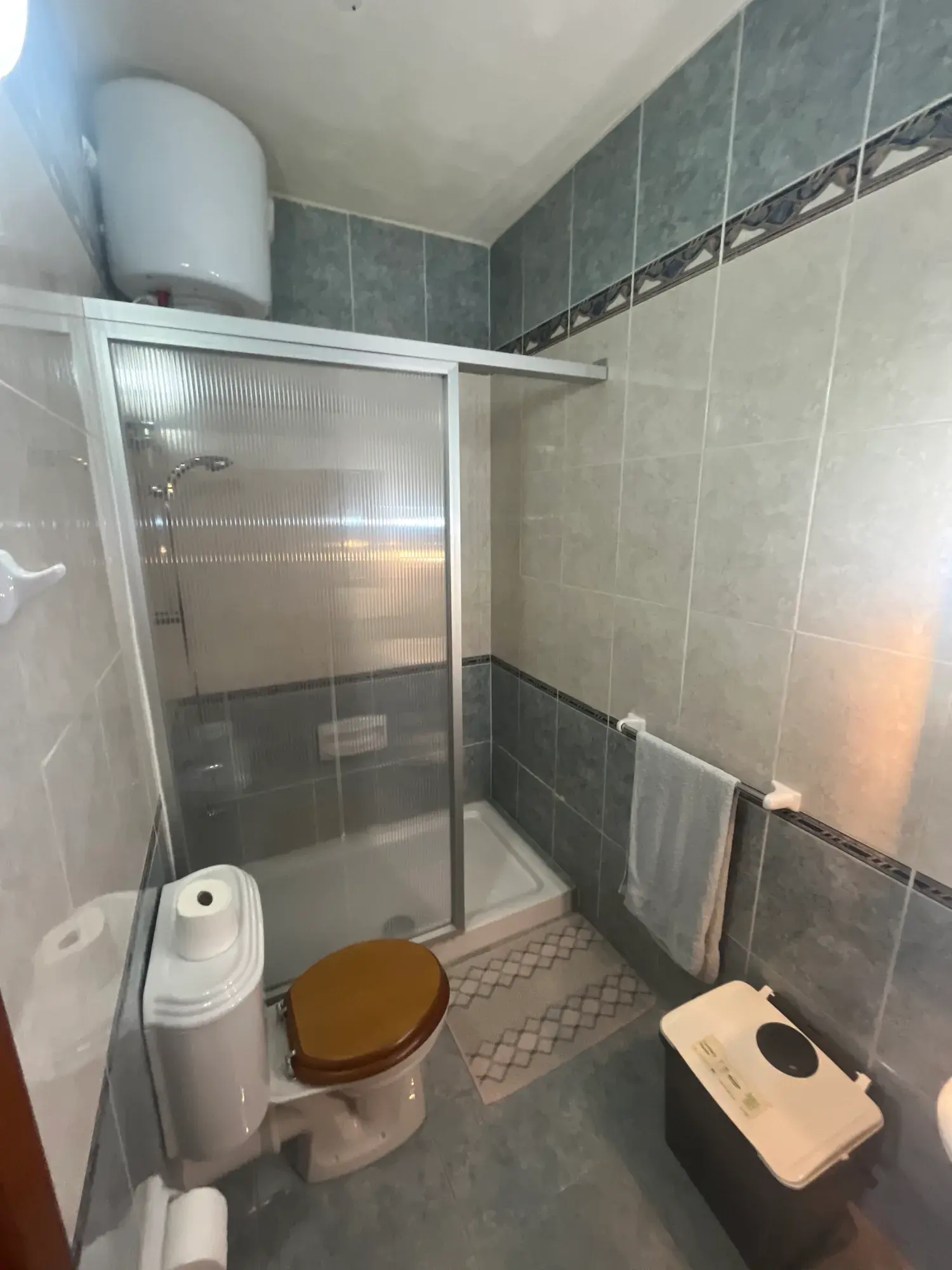 Tiled shower room at Sultana Apartment 4